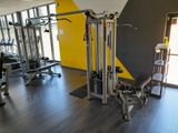 an image of a gym room with equipment in it