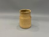 an image of a brown vase sitting on top of a white table