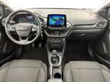 the interior of a car with a steering wheel, dashboard, and dash board