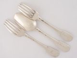 three forks and a spoon are sitting next to each other