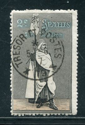 an old stamp with a picture of a man holding a sword