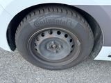 a close up of a tire on a car ' s rim