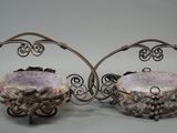 pair of silver plated fruit baskets with grapes and leaves