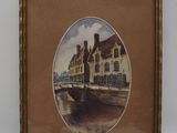 an old picture of a building with a bridge in front of it