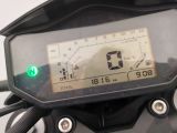 a close up of a motorcycle with a speedometer on it ' s display