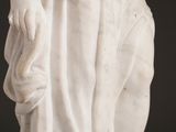 a statue of a woman holding a baby in her arms
