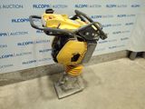 an image of a yellow and black machine on a stand