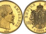 an image of a gold sovereign coin with a crown on it