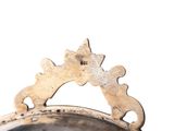 a large metal bowl with a decorative design on it