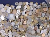 a lot of coins that are in a blue container