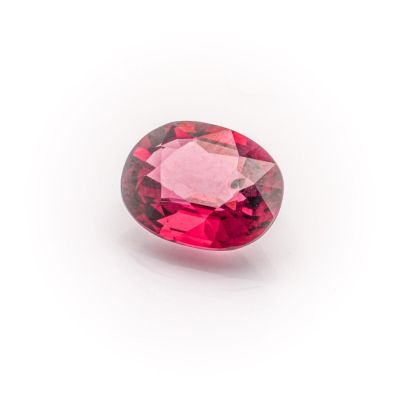 a pink tourmaline gems on a white background