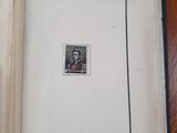 an open book with a picture of a man on it
