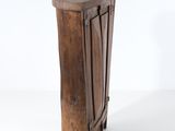 a small wooden table with a drawer on it