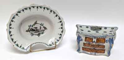 a small plate and a small bowl sitting next to each other