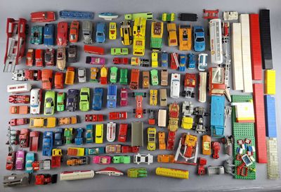 a lot of toy cars that are on the table