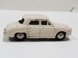 a toy car that is sitting on a white surface