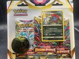 une boîte de cartes à collectionner Pokémon et une balle