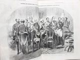 an old book with a picture of a group of people