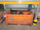 a large orange box with a bike inside of it