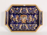 an image of a blue and gold plate with a design on it