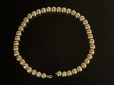 Collier trois or 18K, orné de perles godronnées. - Photo 1