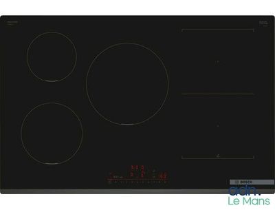 gros plan d'une cuisinière noire à quatre brûleurs