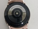 a close up of a smart watch on a table