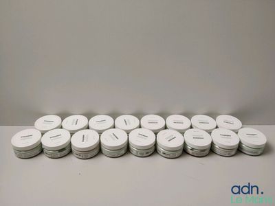 a lot of white pills sitting on a table