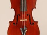 a close up of a violin with a bow on a white background