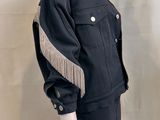 black jacket and skirt with fringes on mannequin mannequin mannequin mannequin mannequin mannequin mannequin mannequin
