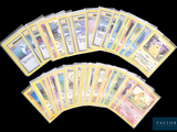 the pokemon trading cards are lined up on a black background