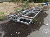 an image of a metal frame laying on the side of the road