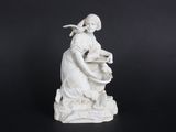 statue of a woman with a basket of flowers on a black background