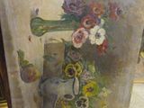 une photo d'une photo représentant un vase orné de fleurs