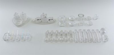 several pieces of clear plastic are arranged on a white surface