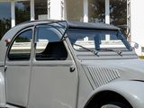 a car that is parked in front of a building