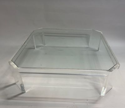 table basse en acrylique transparent avec plateau en verre