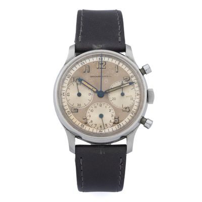 a close up of a watch on a white background