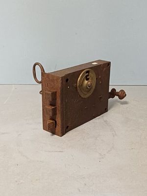 a small clock that is sitting on a table