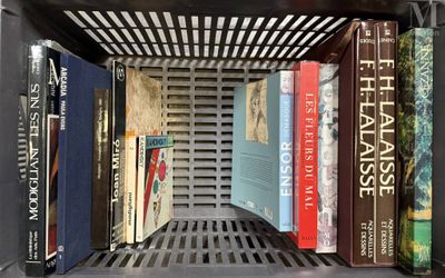 many books that are on a shelf in a book case