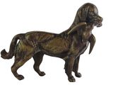 statue of a dog holding a bird in its mouth on a white background
