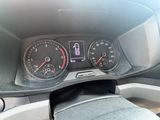 a close up of a car dashboard with a speedometer and gauges