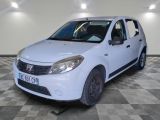 a picture of a small white car parked on a checkered floor