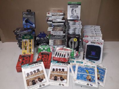 Important lot de jeux video et accessoires gaming