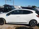 a white car that is parked in a parking lot