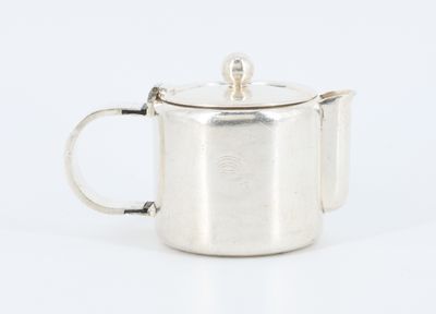 silver plated tea pot with lid and handle