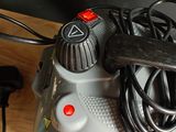 an image of a hair dryer sitting on top of a wooden table