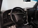 a picture of a car with a steering wheel and dashboard