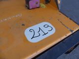a number plate on the back of a tractor