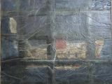 a painting on the wall of a building that has a train on it